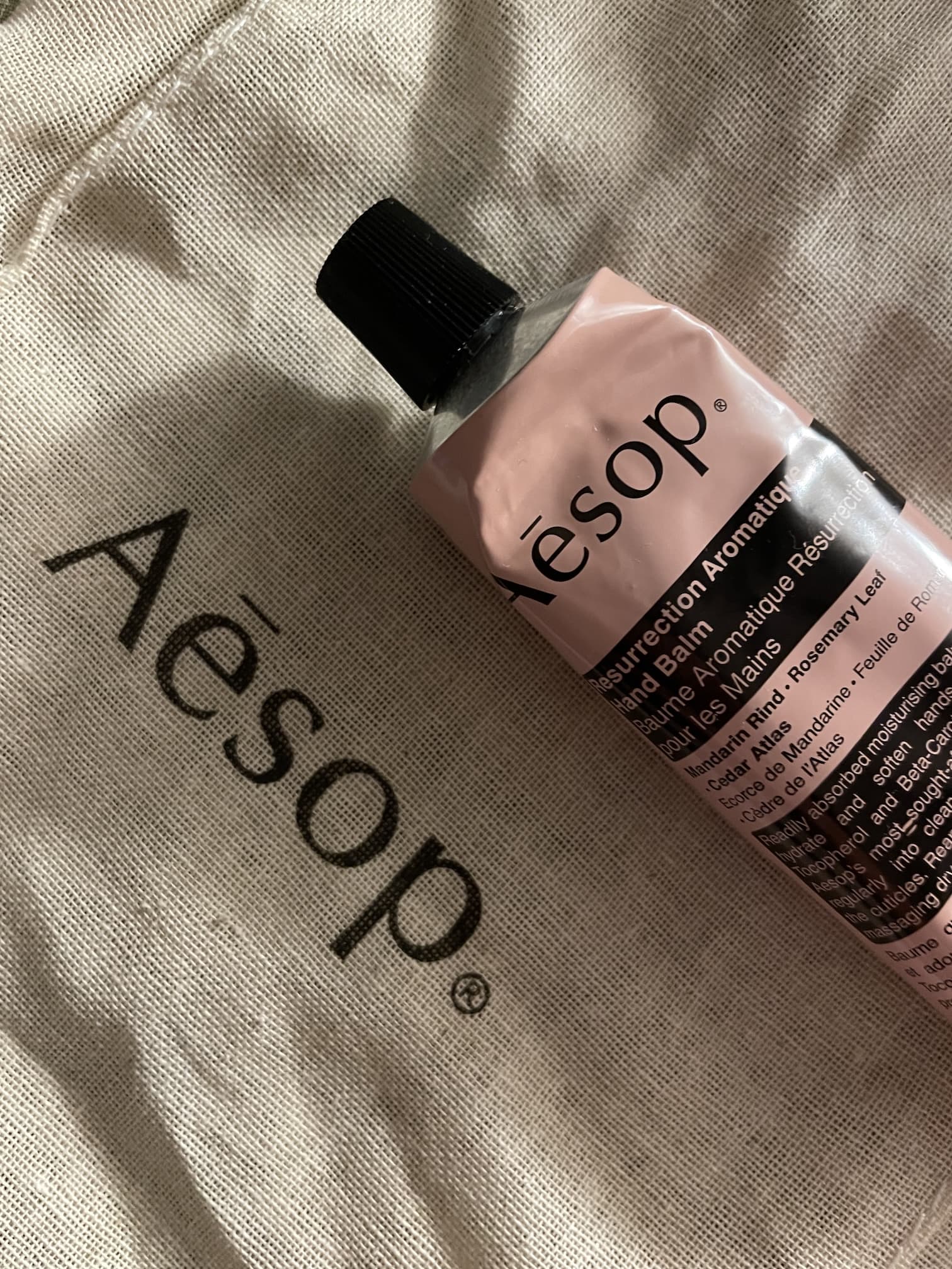 Aesop hand balm shot in warm lighting