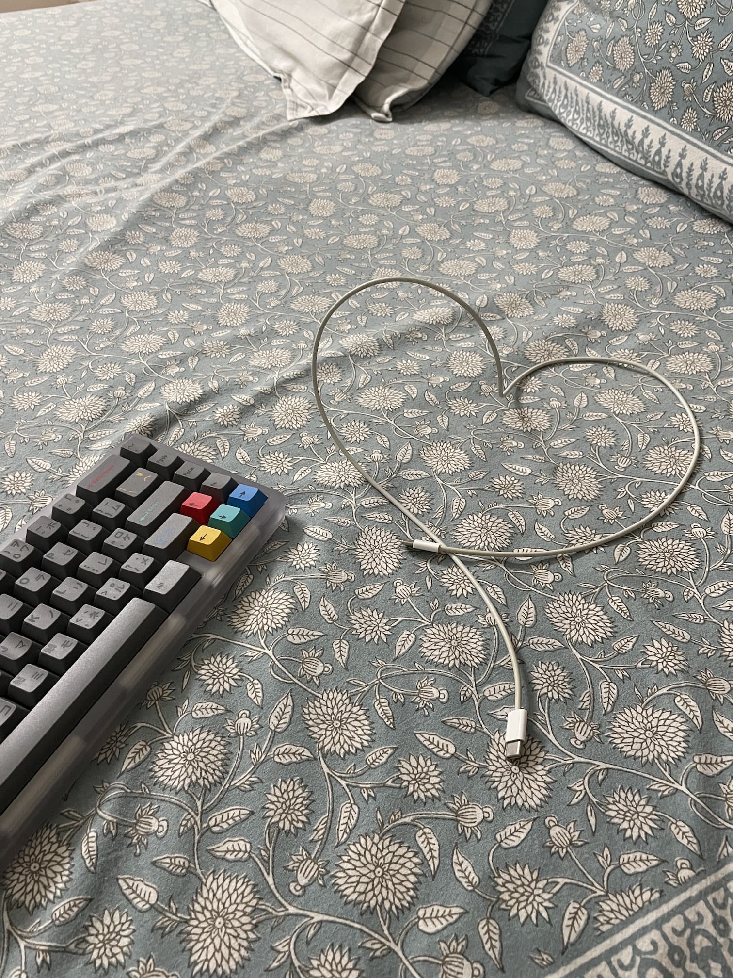 A charging cable coiled up in the shape of a heart — a happy accident