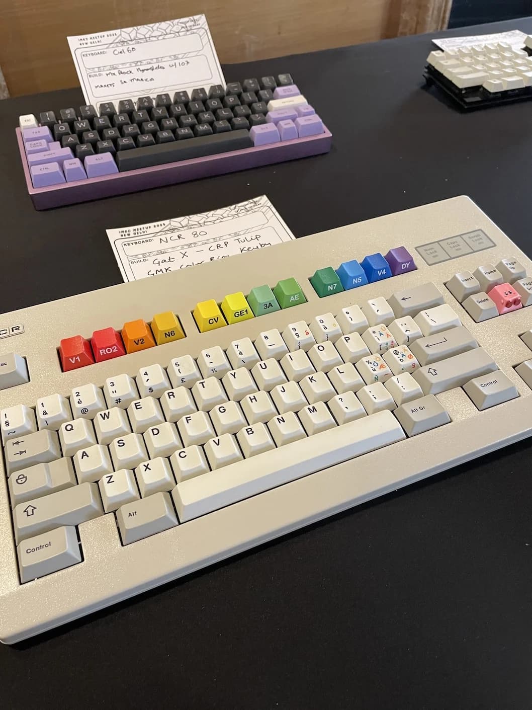A vintage, TKL size mechanical keyboard with beige keycaps